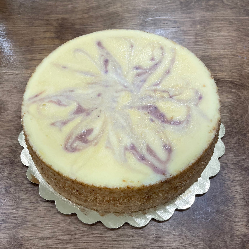 White Chocolate Raspberry Swirl Cheesecake